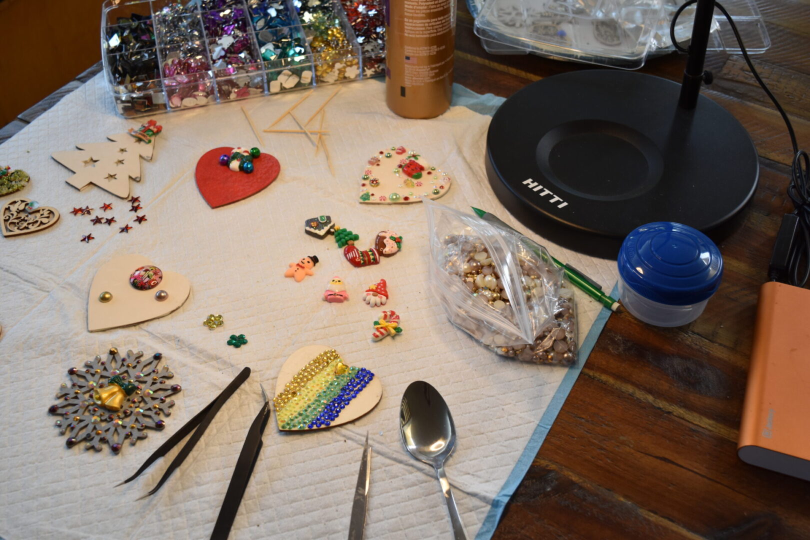 A table with some spoons and other items on it