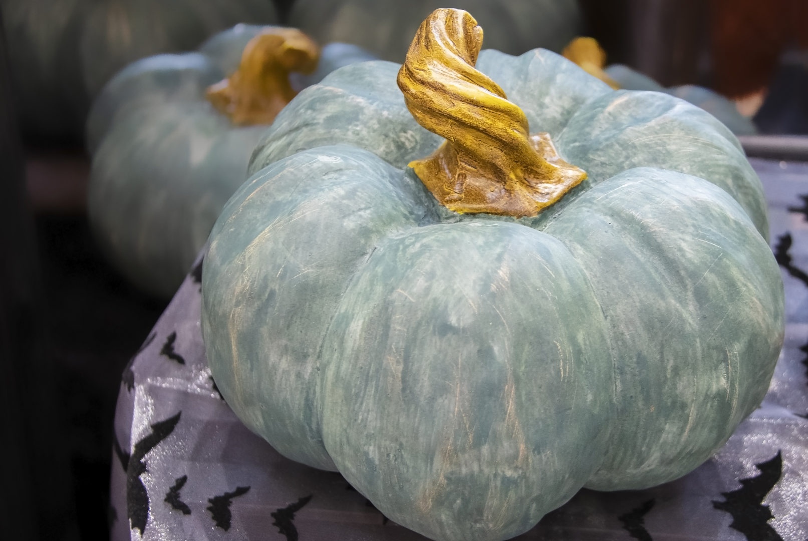 A close up of some pumpkins on display